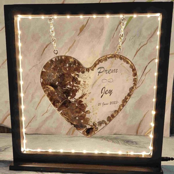 Hanging Single Heart Resin Jaimala Flowers Preserved Frame in LED Lights with Personalized Options (7 Inch Heart), Couple Names & Wedding Date Wooden Frame (12 Inch)
