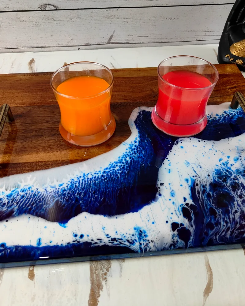 Finished ocean wave resin serving board after curing and polishing